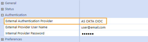 The System Security user configuration page has a grid with row headings that have a blue background with blue text and can be expanded to display fields with a white background and black text. Under the Authentication row heading, the External Authentication Provider field has an Okta OIDC identity provider selected.